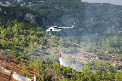 Alanya'da makilik ve ağaçlık alanda çıkan yangın söndürüldü