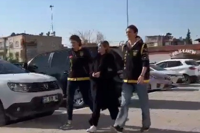 Adana'da lüks otomobilde tabancayla poz veren kadın gözaltına alındı