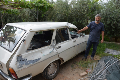 Tarsus'ta çöken istinat duvarı park halindeki otomobilde hasara yol açtı