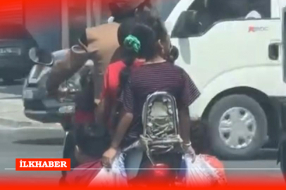 Adana'da insanlık dışı taşıma: Çocuklarını motosiklette çuvalla taşıdı